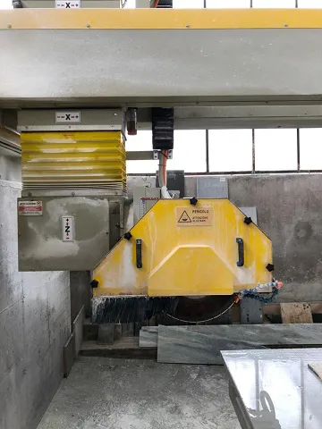 New Omec CNC Bridge Saw